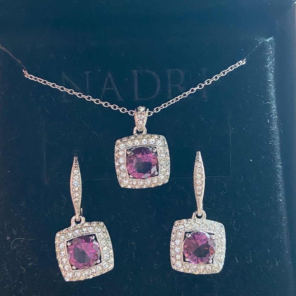 Nadri. Earring and pendant set. Amethyst color